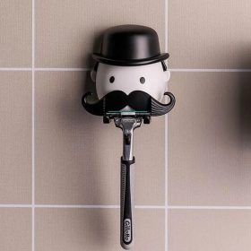   Rukoväť holiaceho strojčeka, prísavný nástavec, hygienický úložný priestor, odnímateľný