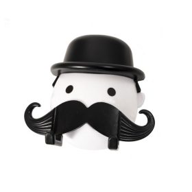   Rukoväť holiaceho strojčeka, prísavný nástavec, hygienický úložný priestor, odnímateľný